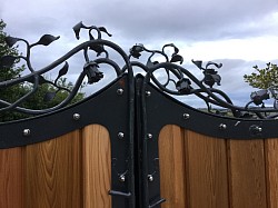 Gate detail depicting Roses - Kingskerswell, Devon