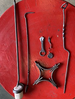 Bottle opener, patio weed hook, candle holder, trivet and key rings