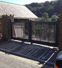 Entrance gates to visually allow light but not curious onlookers!